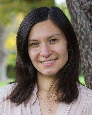 Photo of Geanina Roman, Counsellor, DCounsPsych, MBACP