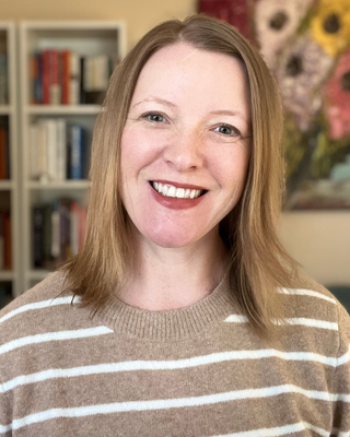 Photo of Dr. Julia King, Psychologist, PsyD, MBA, RYT 200