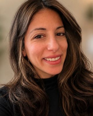 Photo of Daniell Cohen Bertagnolli, Counselor, MA, LMHC, ATR,RYT
