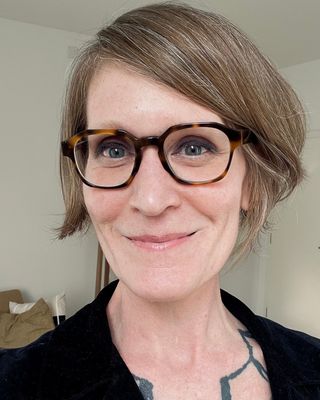 Photo of Kris Moore, Counsellor, MA