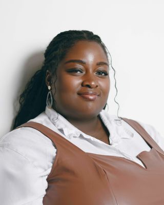Photo of Tomiwa Arogundade, Pre-Licensed Professional, MC, BA