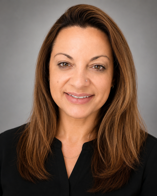 Photo of Erica Slota, Licensed Professional Counselor, MA, MEd, LPC, NCC, ACS