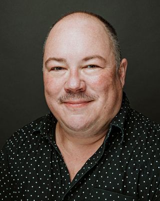Photo of Jonny C Cameron, Master Social Worker, LLMSW