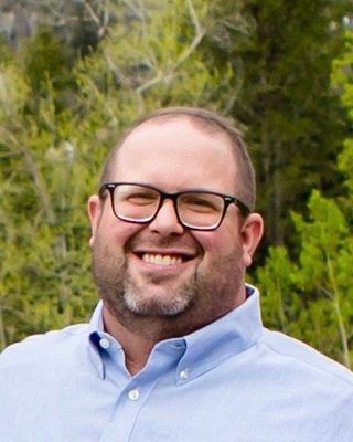 Photo of Brett Hoxer, Counselor, MA, CMHC
