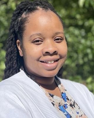 Photo of Tameka Smith, Mental Health Counselor, MEd, MS, LMHC, APC