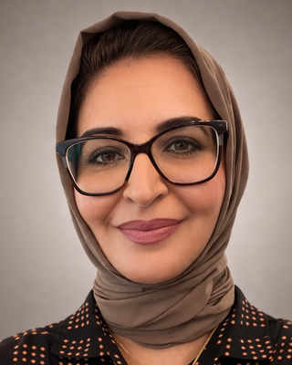 Photo of Manijeh Sheik, Licensed Professional Counselor, MA, LMHC