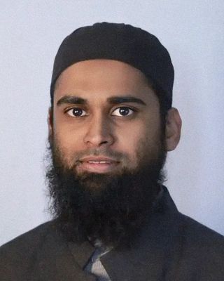 Photo of Munsif Mubarak, Registered Psychotherapist, MPS, EMDR