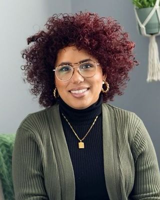 Photo of Regina Rosario, MHSP, NCC, MA, Licensed Professional Counselor