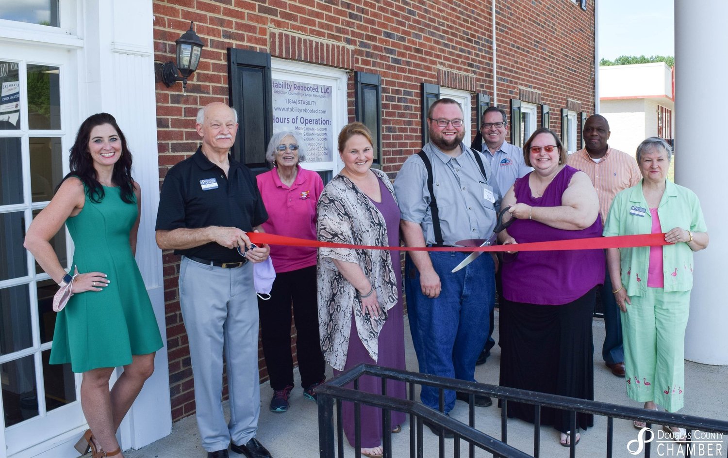 Gallery Photo of We are proud members of the Douglas County Chamber of Commerce.  This is our Ribbon Cutting Ceremony.