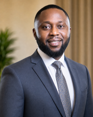 Photo of Olumide Remi-Johnson, Psychiatric Nurse Practitioner, APRN, FNP-C, PMHNP