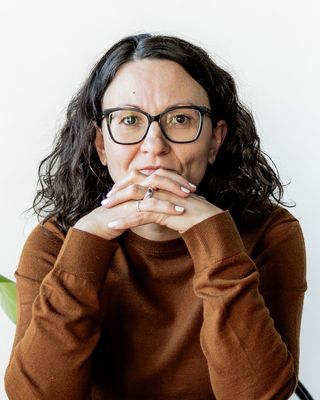 Photo of Dr. Adina Coroiu, Psychologist, PhD, OPQ, CPsych