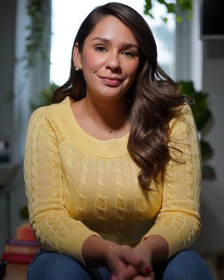 Photo of Gina Frattallone, Psychotherapist, MA, UKCP Trainee