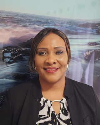 Photo of Mary Elumogo, Psychiatric Nurse Practitioner, DNP, APRN, PMHNP, BC, RN