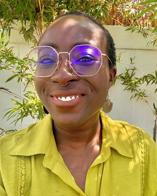 Photo of Grace Korley, Counselor, MA, LMHC, MFTI, NCC, RYT