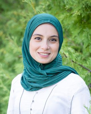 Portrait of Ingi, Registered Social Worker offering online counselling