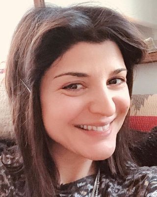 Photo of Anna Kuyumcuoglu, Art Therapist, MA, LCAT , ATR-BC, ACCEP, EMDR