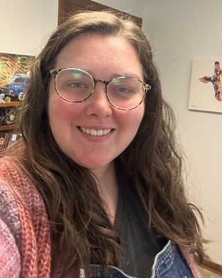 Photo of Em Proctor, Counselor, MA, LCMHC