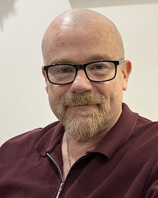 Photo of Jon Farham, Counsellor, ACA-L2