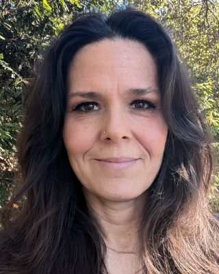 Photo of Zoe Davis, Licensed Professional Clinical Counselor, MA, MS, LPCC, LMHC, CMHIMP