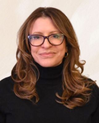 Photo of Elizabeth Scoyne, Counselor, LMHC-D