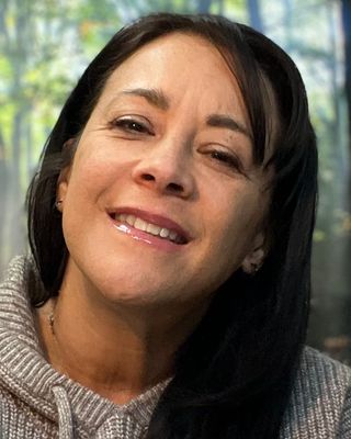 Photo of Dr Hassi Portia Carder-Gilbert, Occupational Therapist, PhD