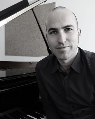 Photo of Paco Casasola, Psychotherapist, MSc, HCPC-Music Therap.