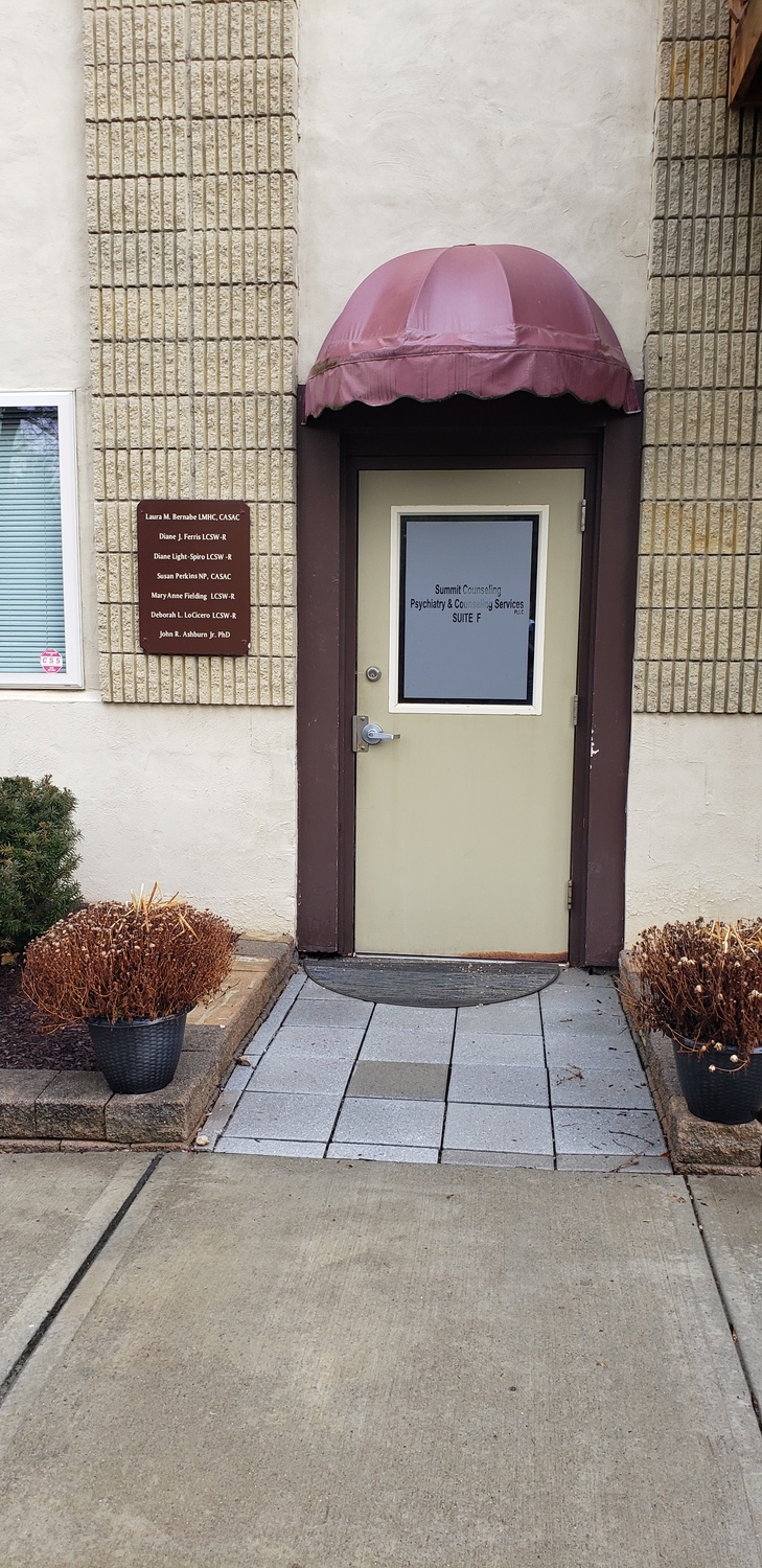 Gallery Photo of Office entrance is on the leftside of the building.