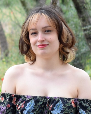 Photo of Emi Booth, Psychotherapist, MA, HCPC-Music Therap.