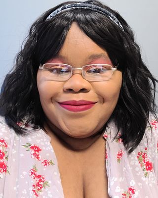 Photo of Xenia Tomlinson, Licensed Mental Health Counselor, LMHC