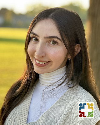 Photo of Julia Bruto, Registered Psychotherapist (Qualifying), MACP, RP(Q)