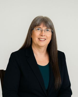 Photo of Helen C Hebb, Registered Psychotherapist (Qualifying), MACP, BEd, OCT