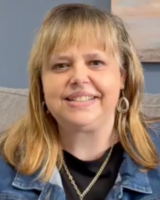 Photo of Liz Schallack, Counselor, PsyD, LCPC