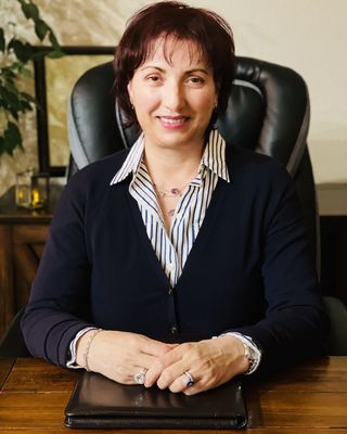 Photo of Dr. Eni R. Schall, Psychologist, PsyD, MBA