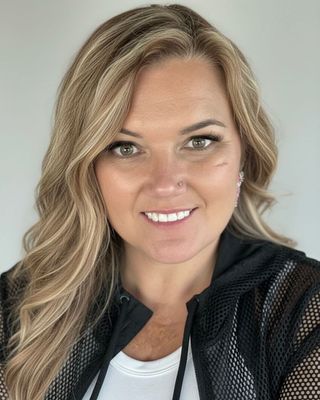 Photo of Dr. Reisha Lynn Caudill, Psychiatric Nurse Practitioner, APRN , FNP-C, PMHNPBC