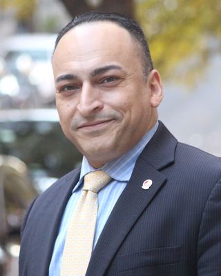 Photo of Wilfredo Muniz, LMHC, CASAC-T, Counselor