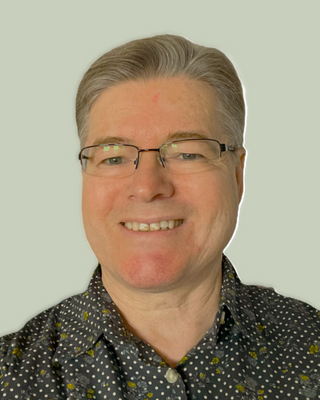 Photo of Ken Raymond, BA, MA, Registered Psychotherapist