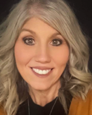 Photo of Carmela Byus, Licensed Professional Clinical Counselor, LPCC, LICDC