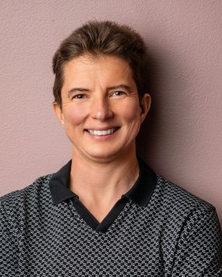 Photo of Chris Quam Sherman, Licensed Professional Counselor, LPC, LCPC, ERYT200, CPT, GFI