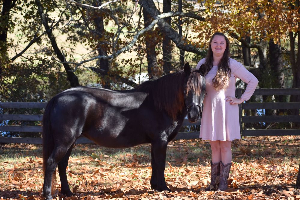Jaclyn, LCSW, CMFT, HSBCP. And Poppyseed, Equine therapist. 