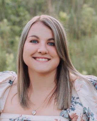 Photo of Sydney Christine Comstock Valadez, Counselor, PLMHP, PCMSW