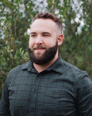 Photo of Cameron Phillips, Counselor, LCMHC-A