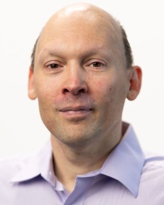 Photo of Aaron Fett, Psychologist, LP