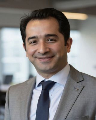 Photo of Dr Ali Khatibi, Psychotherapist, PhD, MBACP