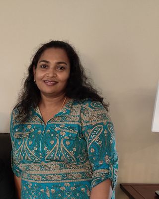 Photo of Dr. Renimol Philip, Psychiatric Nurse Practitioner, DNP, PMHNP, BSN