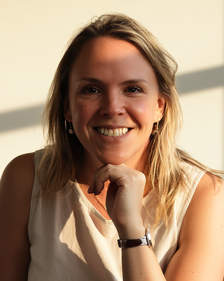 Photo of Lauralie Johnson, Psychiatric Nurse Practitioner, PMHNP, AGACNP, MSN