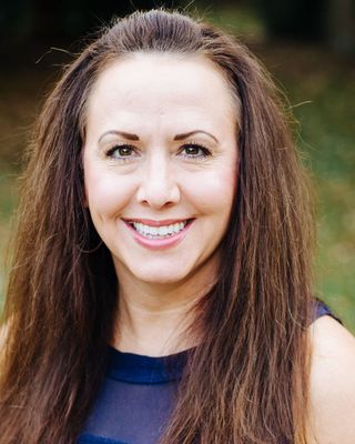Photo of Joy Molina, Counselor, MA, LCMHC, LCAS