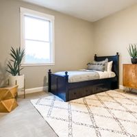 Gallery Photo of Individual bedroom at Embark at San Martin. 