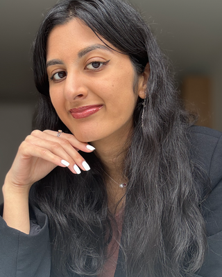 Photo of Yusra Saeed, Pre-Licensed Professional