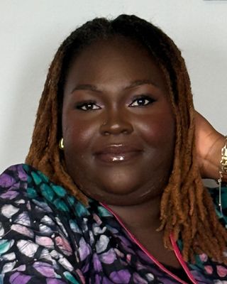 Photo of Ibukun Oresegun, Counsellor, BA, OAMHP