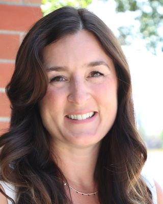 Photo of Katie Hilchey - Katie Hilchey | Trauma Therapy | Somatic IFS, Psychologist, MA, R Psych